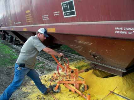 Pneumatic railcar opener improves bulk storage facility